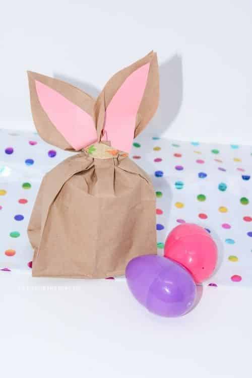 Learn how to make easter bunny bags out of a paper bag.