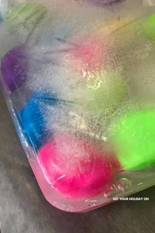 A giant ice block full of frozen Easter eggs.