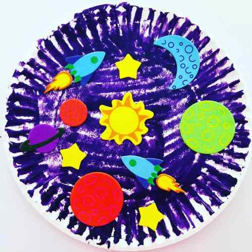 Space themed with planets on a paper plate.
