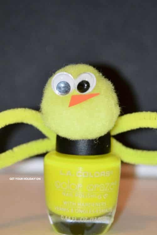 In learning how to make easter nail polish you will find our baby Chick Nail polish with a pom pom head, orange peek, and yellow pipe cleaner to finish off this yellow bottle.