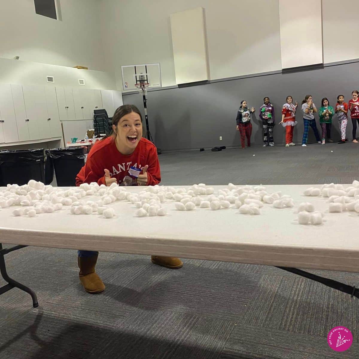 Santa Game cotton balls scattered on table to make a beard