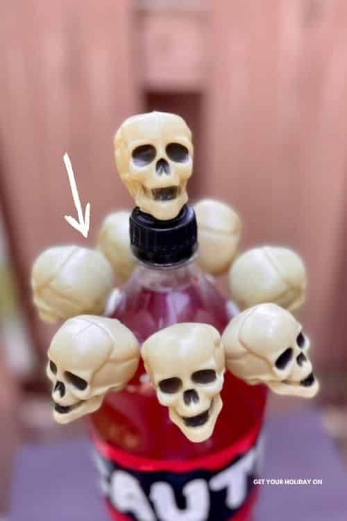 skeleton prize idea Add poster putty to the back of each of the skull to complete this dollar tree skull diy.