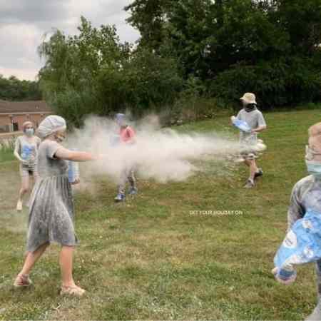 Large group games for youth that is a flour fight battle.