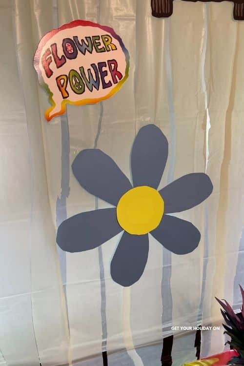 Flower power table cloth for a tie dye party.
