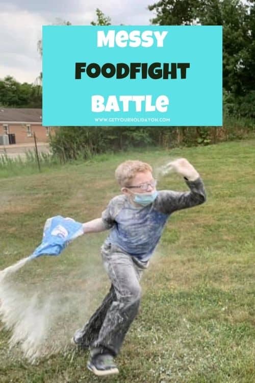 foodfight battle with a teen boy throwing flour outside.