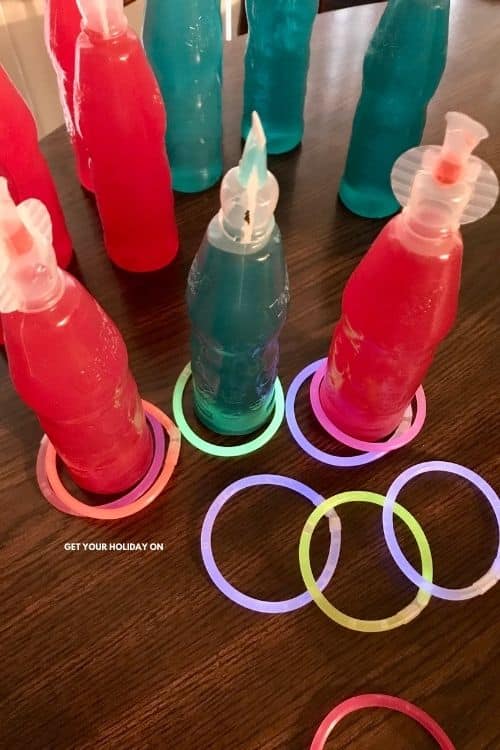 Materials needed for Glow in the Dark bowling You need flavored juice drink bottles and glow bracelets to make glow in the dark bowling.