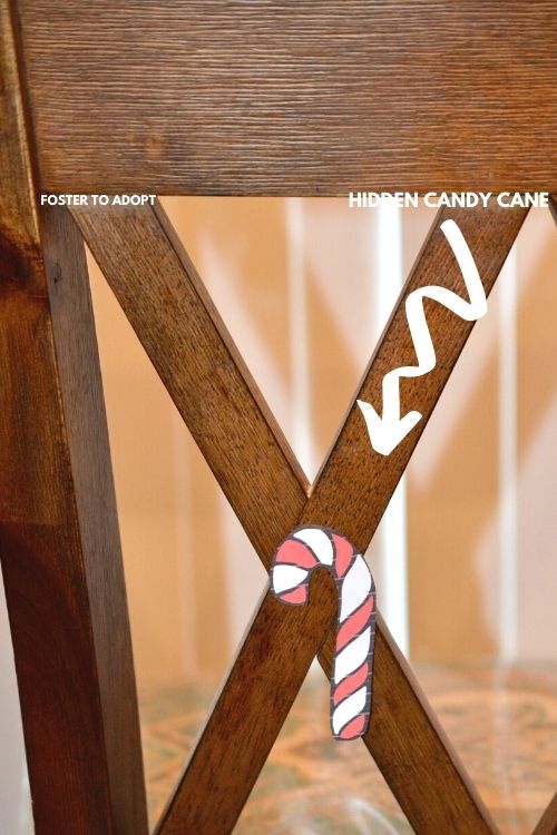 Hidden candy cane spot behind a chair.