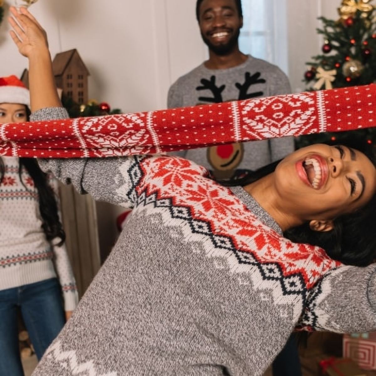Christmas Party DJ games Adult Holiday Party Games including favorites like this Holiday Limbo Game!