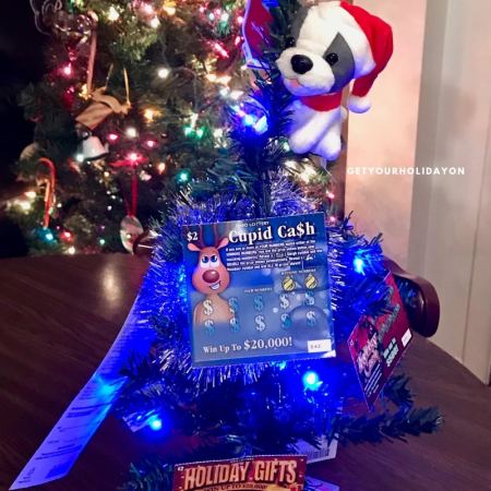 At last, this lottery Christmas tree will be a top pick for your White elephant exchange! #play #party #diys #partyfavors