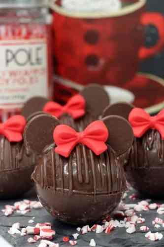 Minnie Mouse hot cocoa bombs with bows.