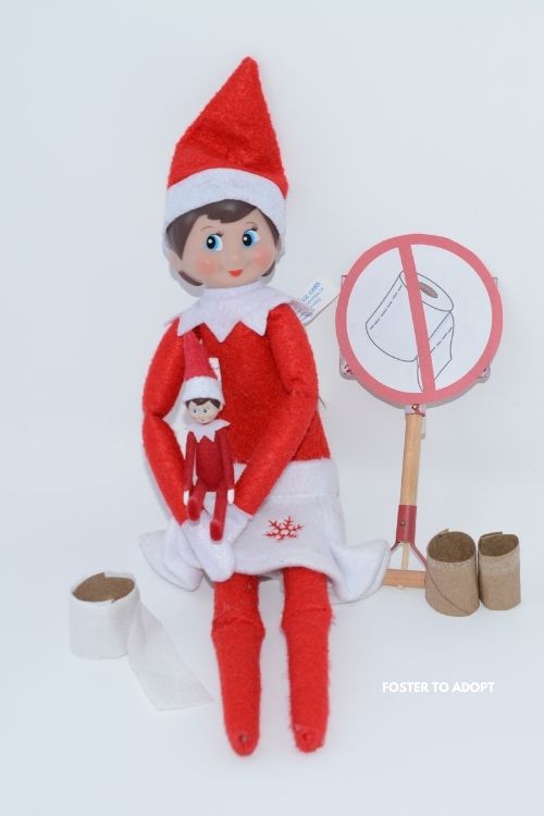 no toilet paper elf sign.