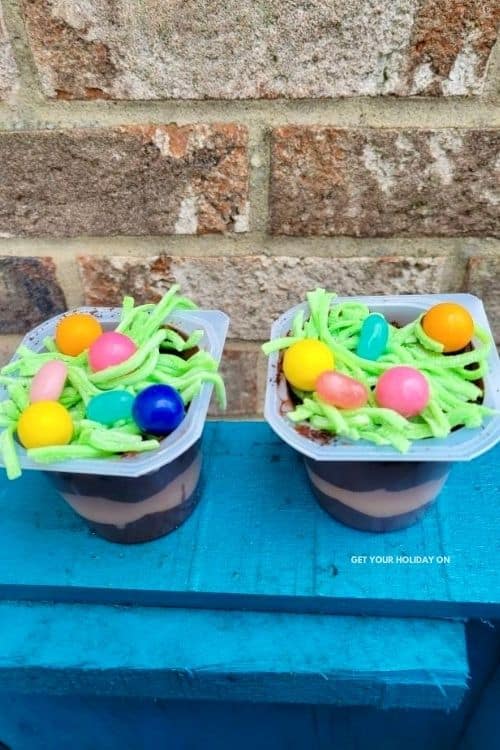 pudding cups with edible treats inside of them for adults.
