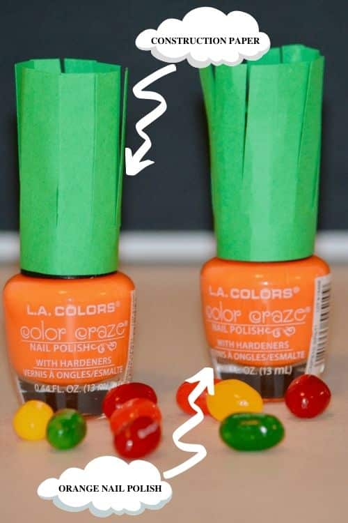 Just two supplies will make carrot top nail polish. The supplies needed are construction paper and orange nail polish.