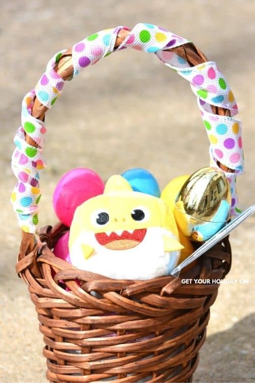 baby easter basket with shark plush and eggs